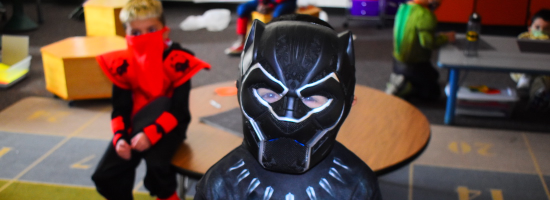 Student in black panther costume